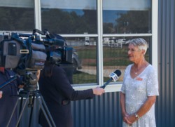 Volunteer Birgit Smith interviewed by WIN News at the opening of CUC Mudgee Region, 27 March 2024.
