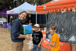 Sam chats with future university students at the first Gulgong Community Picnic Day in April 2026.