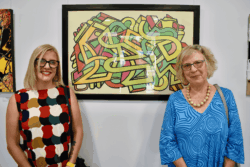 Shapes exhibition prizewinners Jayne Blake and Janet Marcus with Jayne's winning artwork, 'In My Mind'.