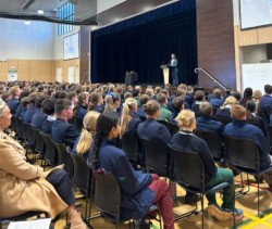Student Services Coordinator Sam Paine addresses St Matthew's Catholic School Secondary Campus.