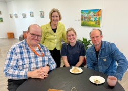 CSU Vice-Chancellor Professor Renée Leon visits with local CSU students Thomas, Sian and John.