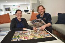 Working on the jigsaw puzzle.